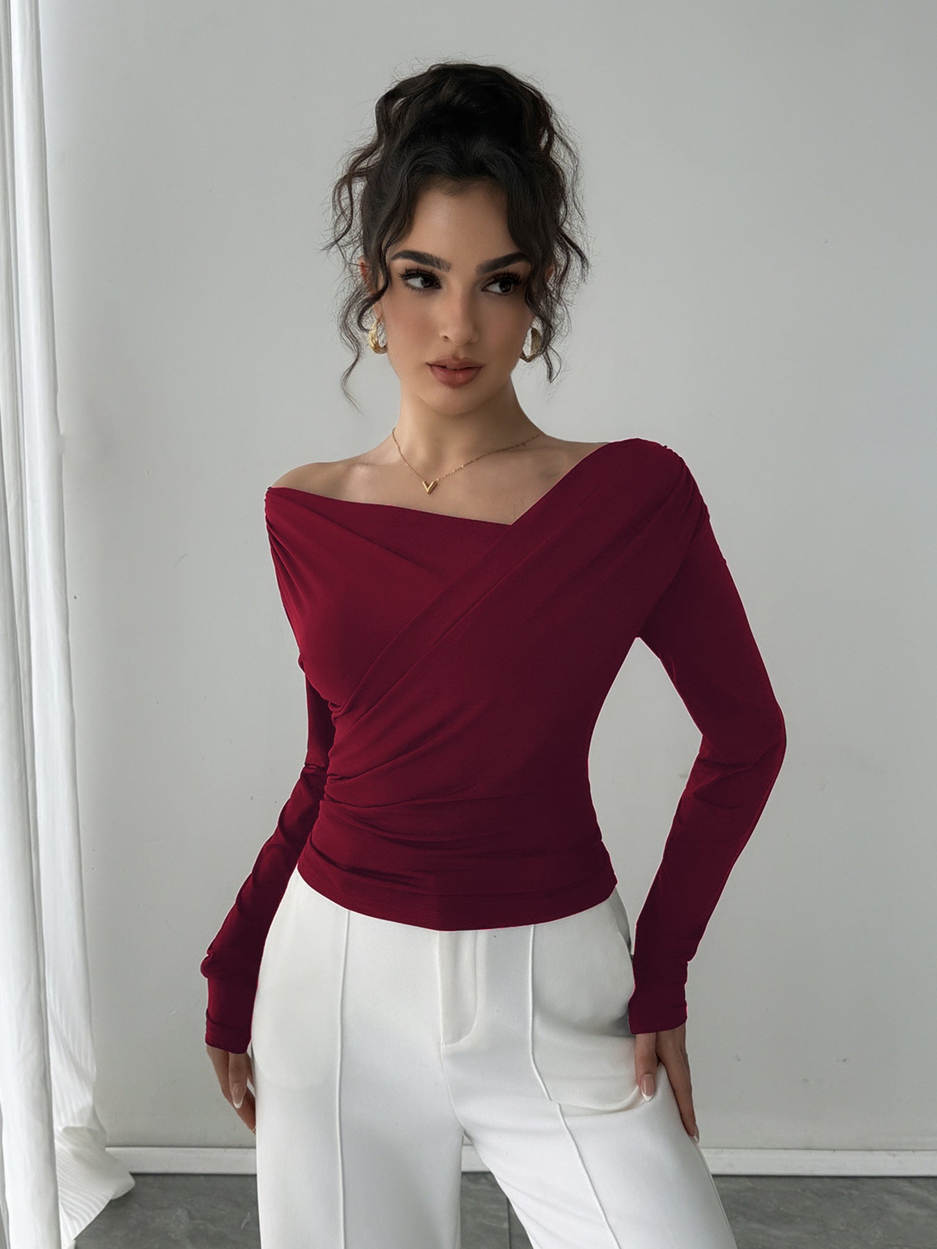 Solid color slanted shoulder collar off shoulder long sleeved shirt