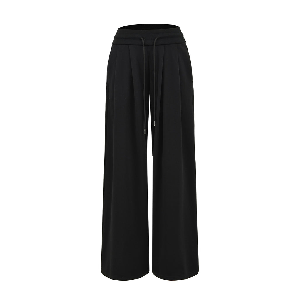 High waisted wide legged floor hugging sports pants