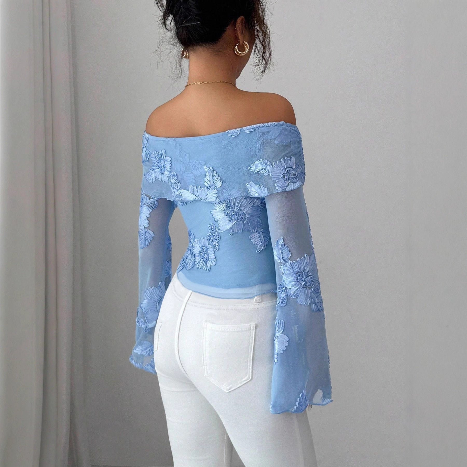 Women's single neck flared sleeve asymmetrical hem top